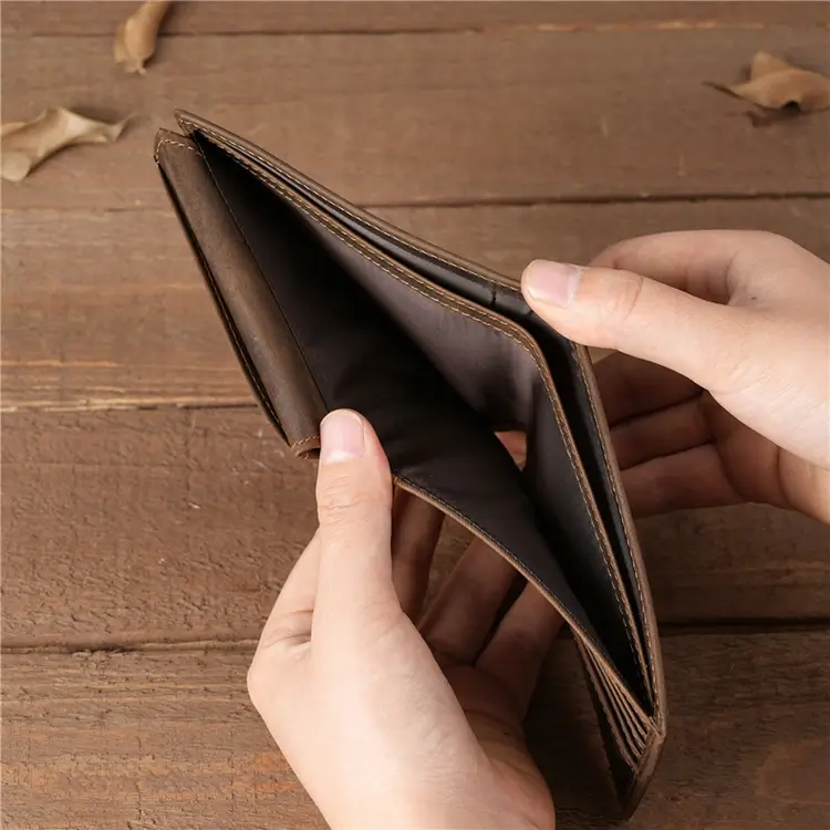 Interior card slots of a dark brown full grain leather wallet